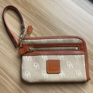 Dooney & Bourke multi function zip around wristlet
